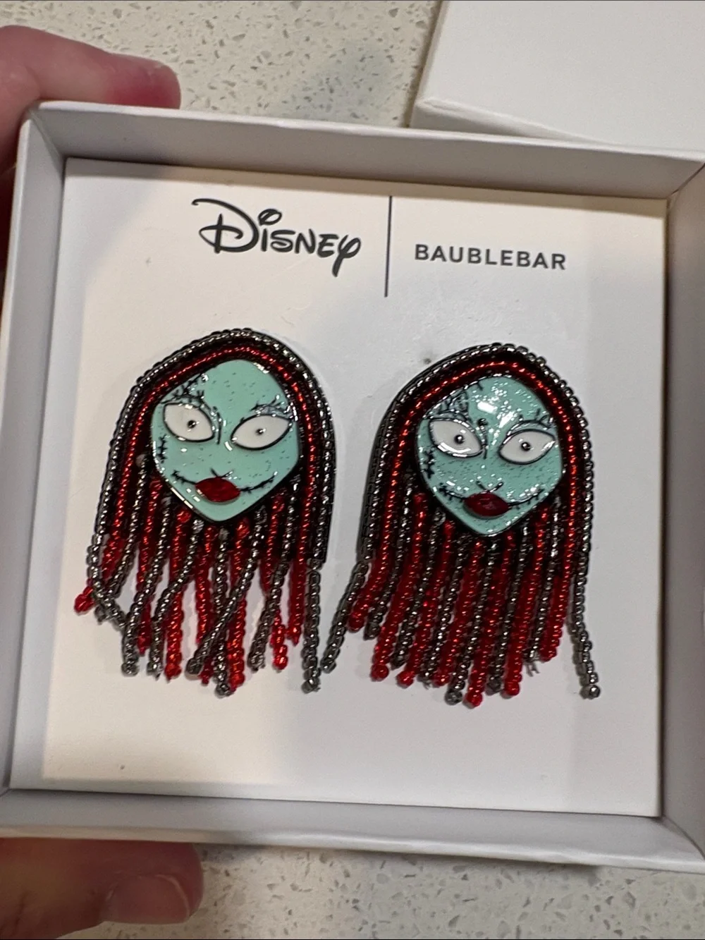 BaubleBar Disney Nightmare Sally Enamel Face Fringe Earrings - Red and Teal